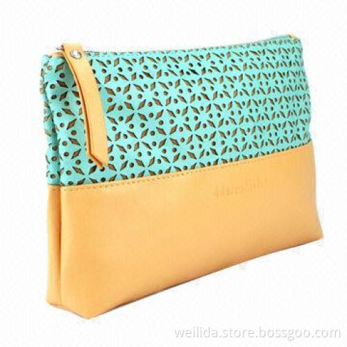 PU cosmetic bags with die-cut pattern on body, 18x12cm, 190T lining, nylon zipper